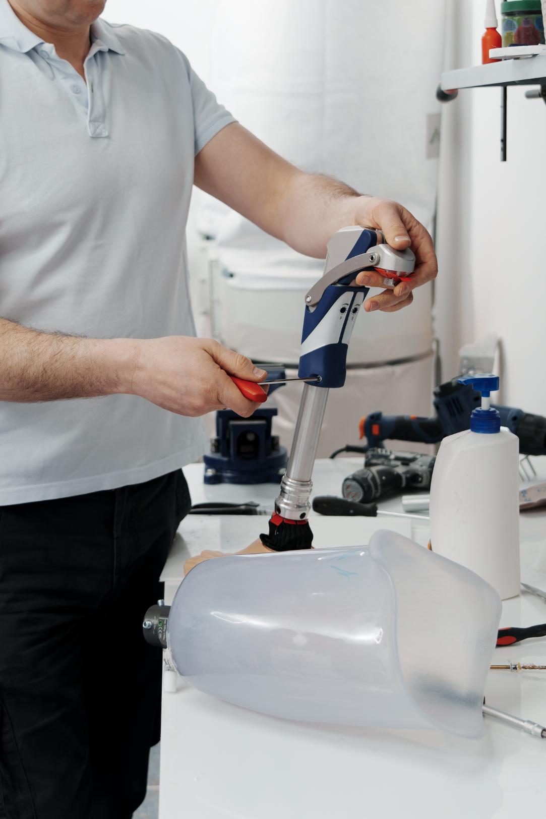 Craftsman using precision tools for plumbing work